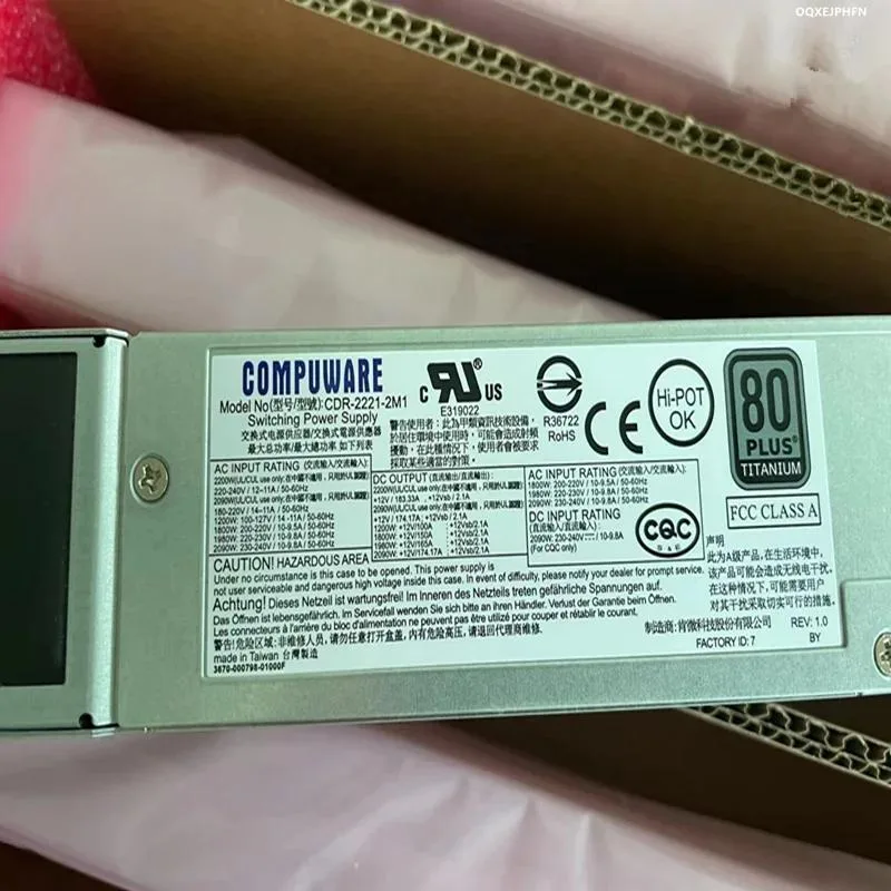 Black ATX power supply unit with cooling fan and cable bundle