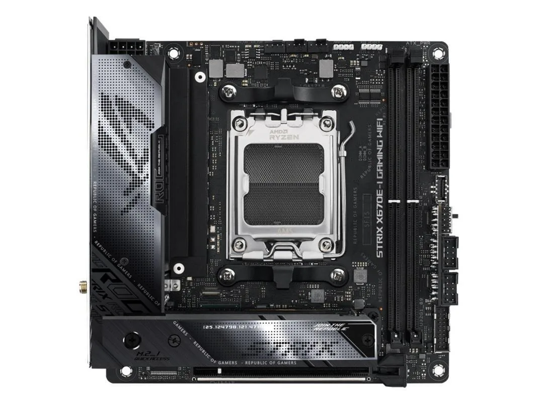 Compact Mini-ITX motherboard with dark PCB, silver heatsinks and rear I/O shield