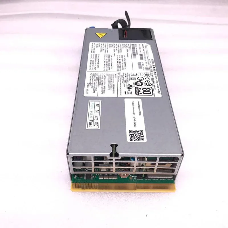 Silver rectangular server power supply unit with rear fan grille and power socket