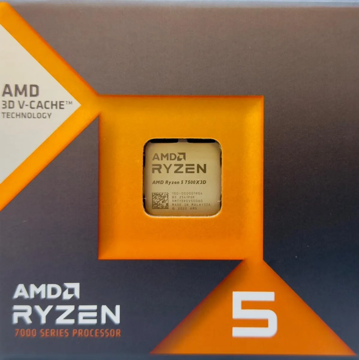 Green square CPU with gold contacts and silver heatspreader, AMD Ryzen 5 7500X3D boxed processor