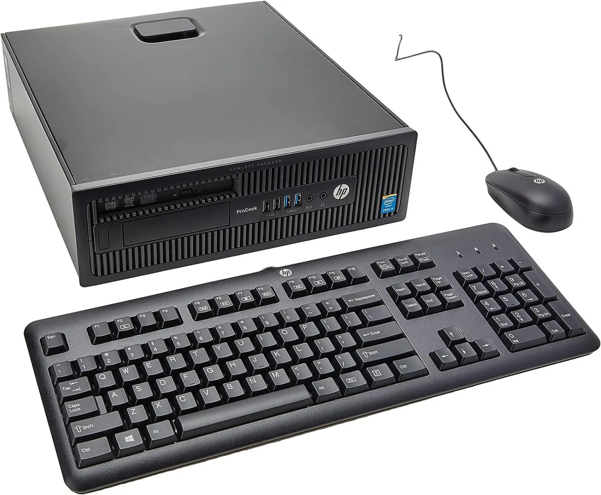 Compact silver desktop tower, small form factor, new condition