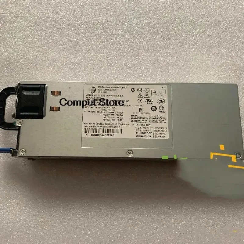 Silver rectangular ATX power supply unit with ventilation grille