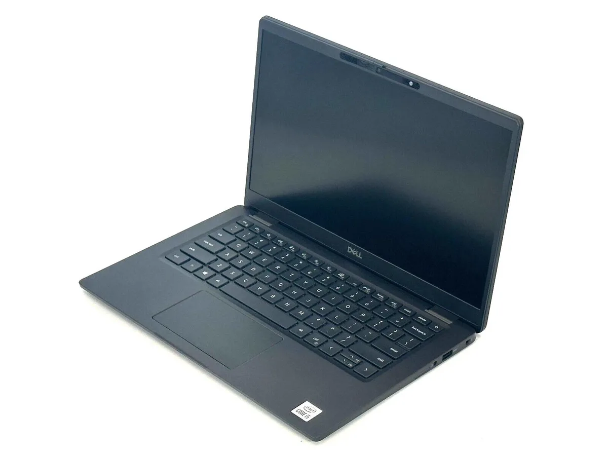 Silver Dell Latitude 7310 laptop open showing 13.3 inch touchscreen and backlit keyboard