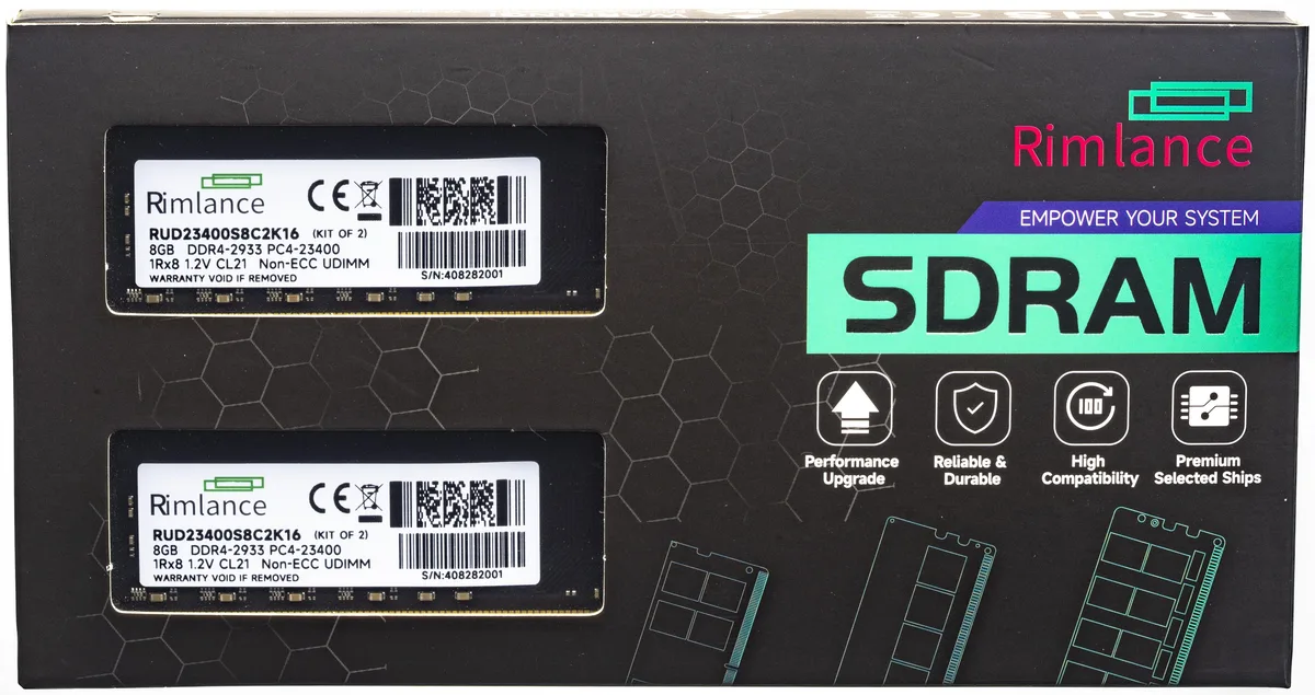 Two green circuit boards with black memory chips and gold contacts side by side