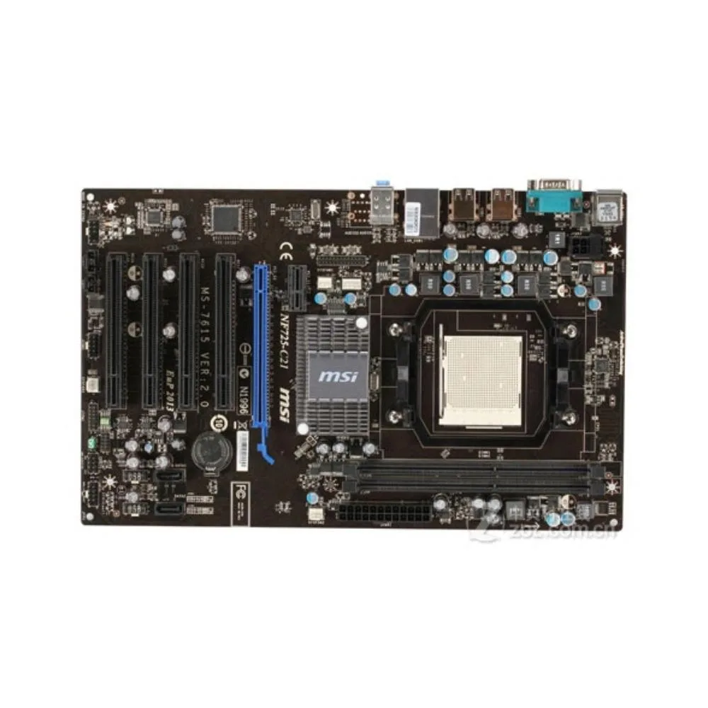 Green ATX motherboard with silver heatsinks and black expansion slots