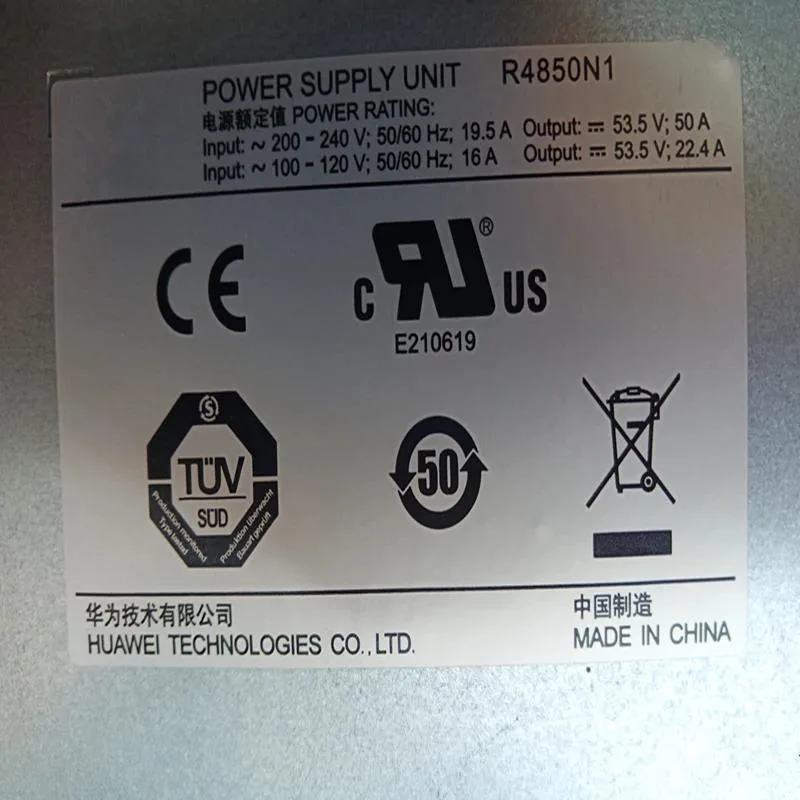 Silver rectangular ATX power supply unit with ventilation grille and power socket