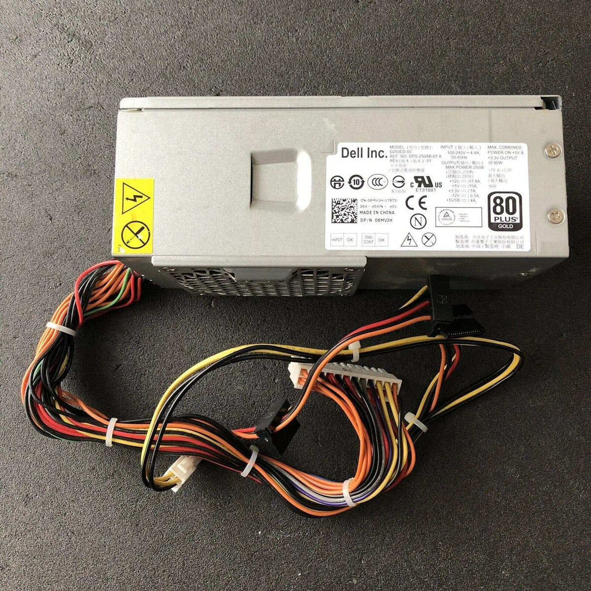 Rectangular metal ATX power supply unit with single cooling fan and 24-pin connector