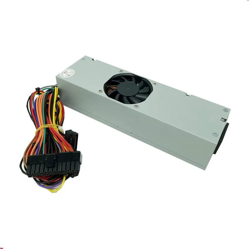 A silver TFX power supply unit with ventilation grille and power connectors