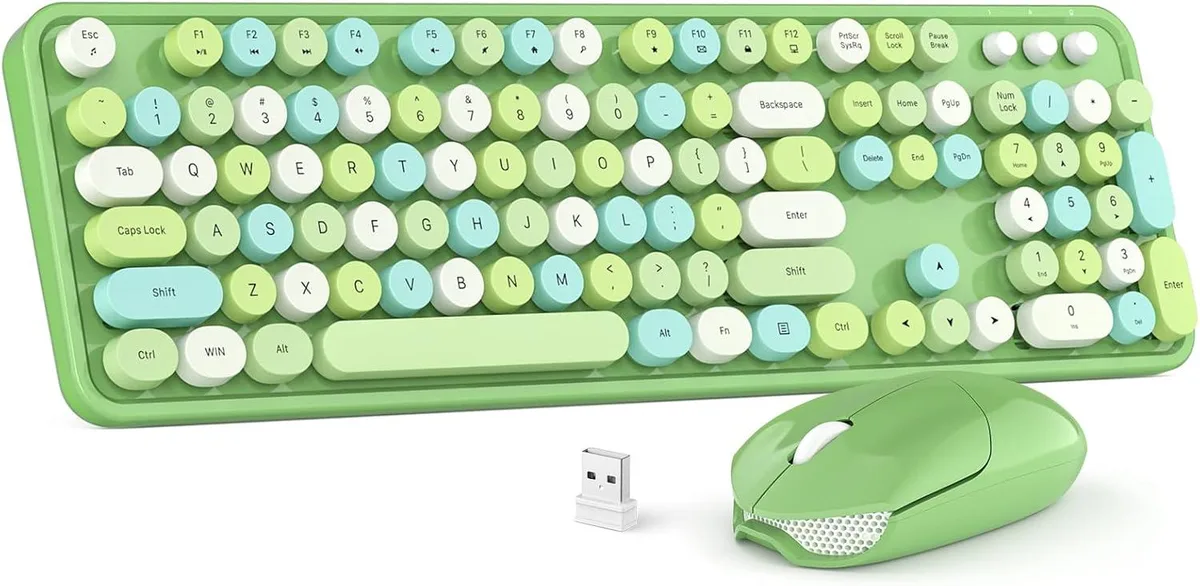 Green full-size wireless keyboard with round retro keycaps and matching mouse on a single USB receiver