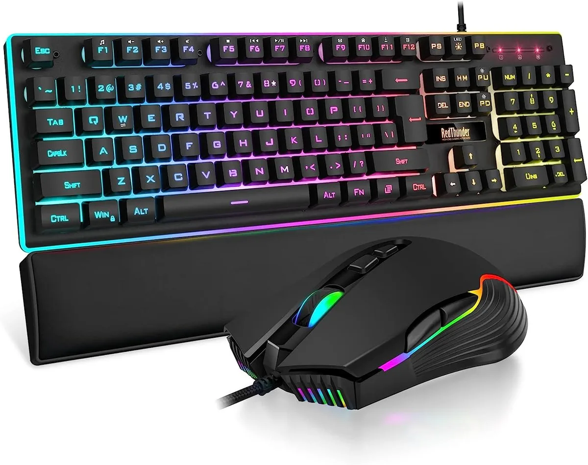 Black full-size wired keyboard with RGB backlighting, matching ergonomic mouse and leather wrist rest