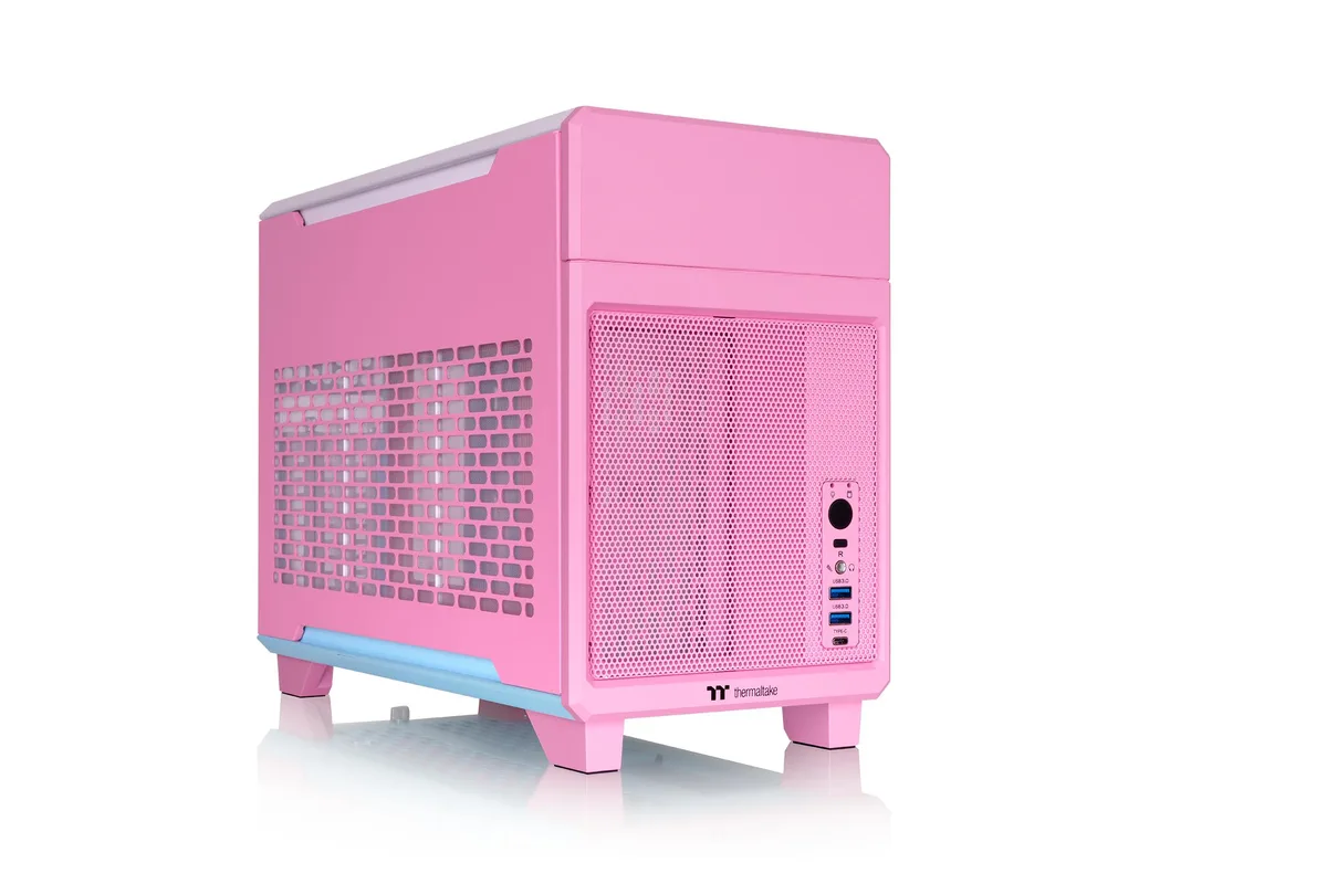 Compact pink mini tower case with plastic panels, dual chamber layout, no fans installed