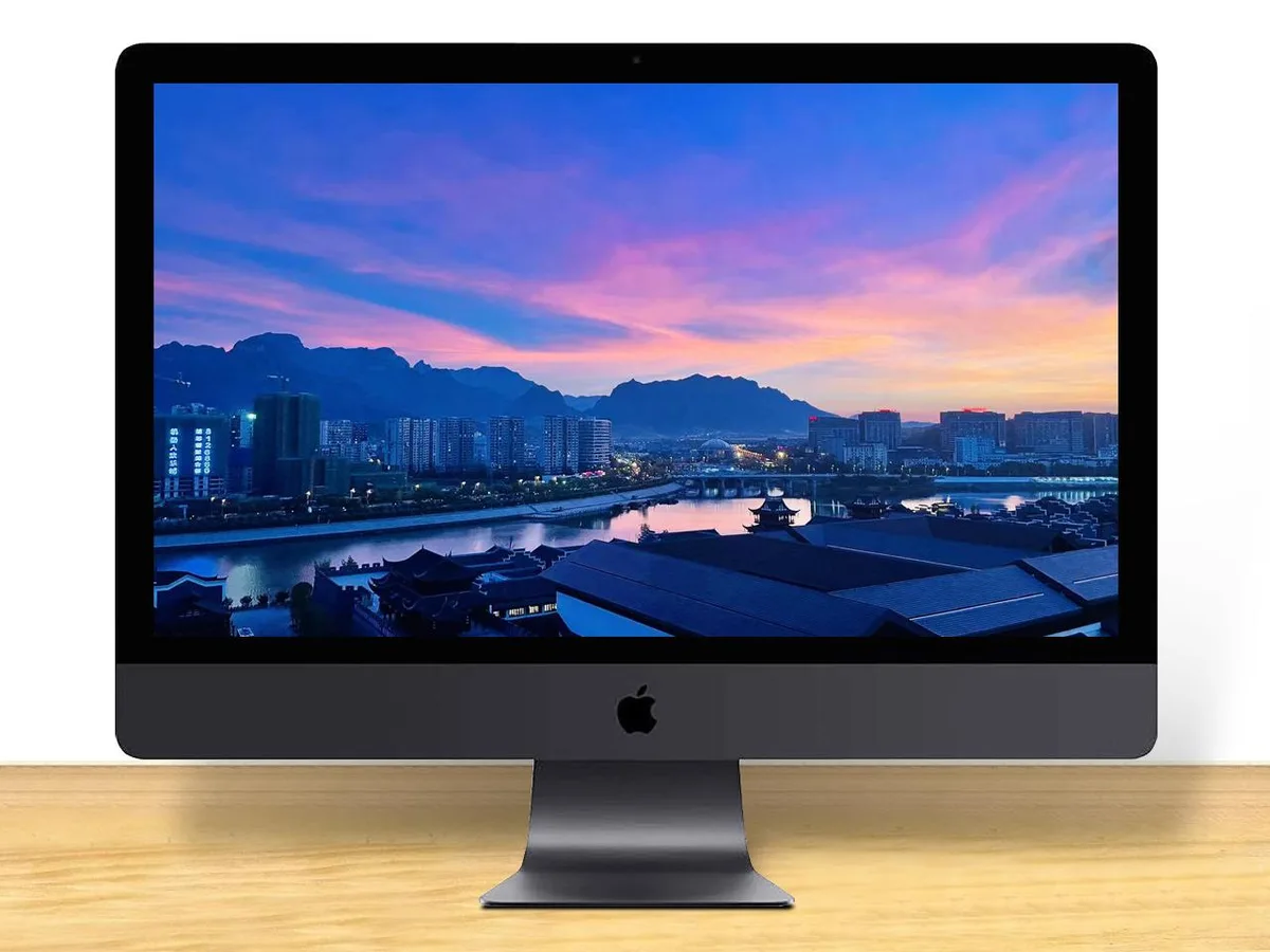 Space Gray all-in-one iMac Pro with 27-inch Retina 5K display, wireless keyboard and mouse
