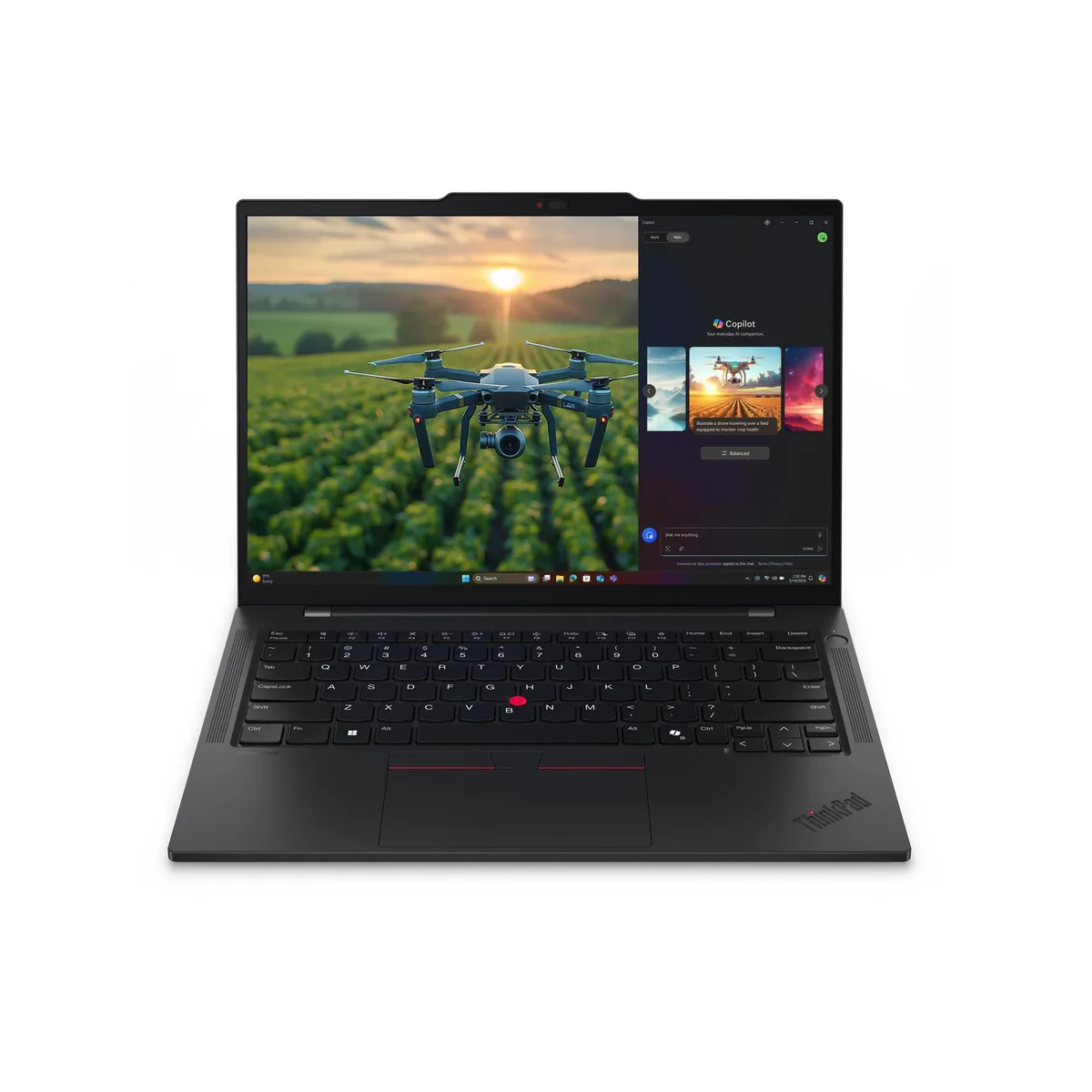 Silver 14 inch laptop closed showing ThinkPad logo and red TrackPoint nub