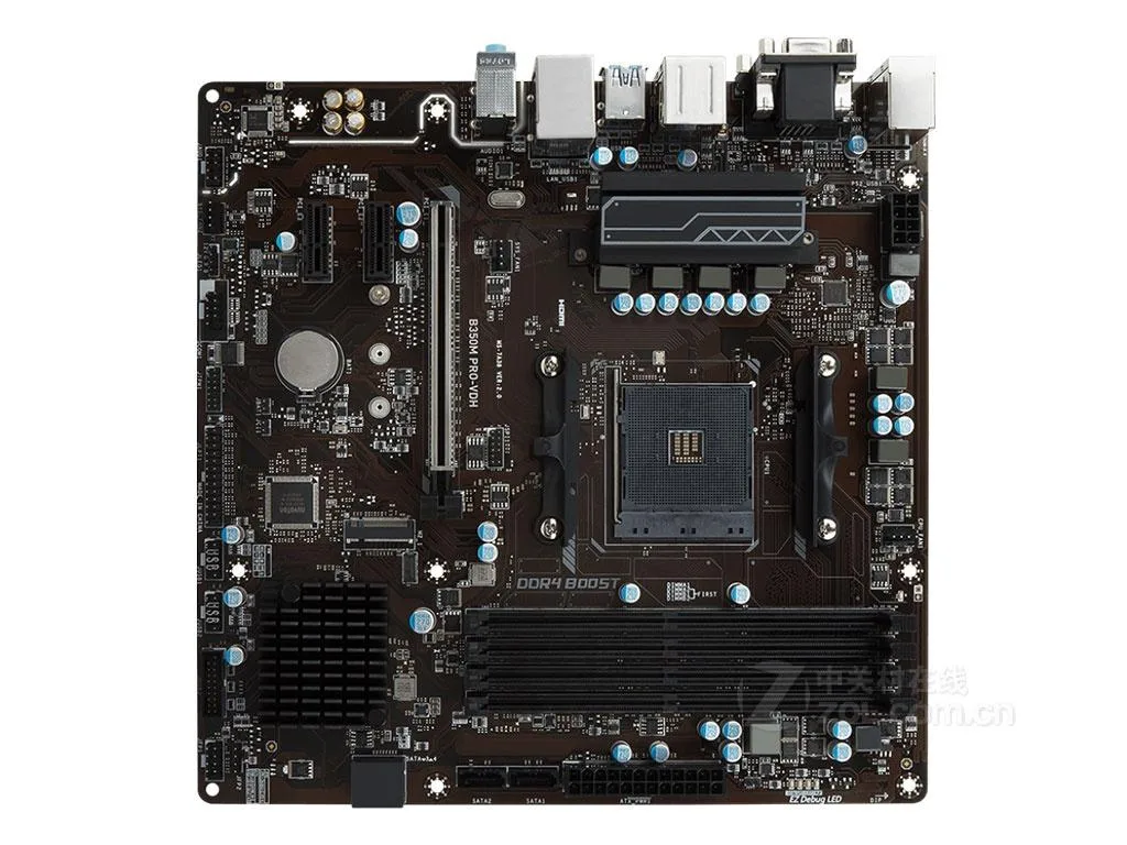 Green rectangular Micro ATX board with silver AM4 socket, black DDR4 slots and grey PCIe slots