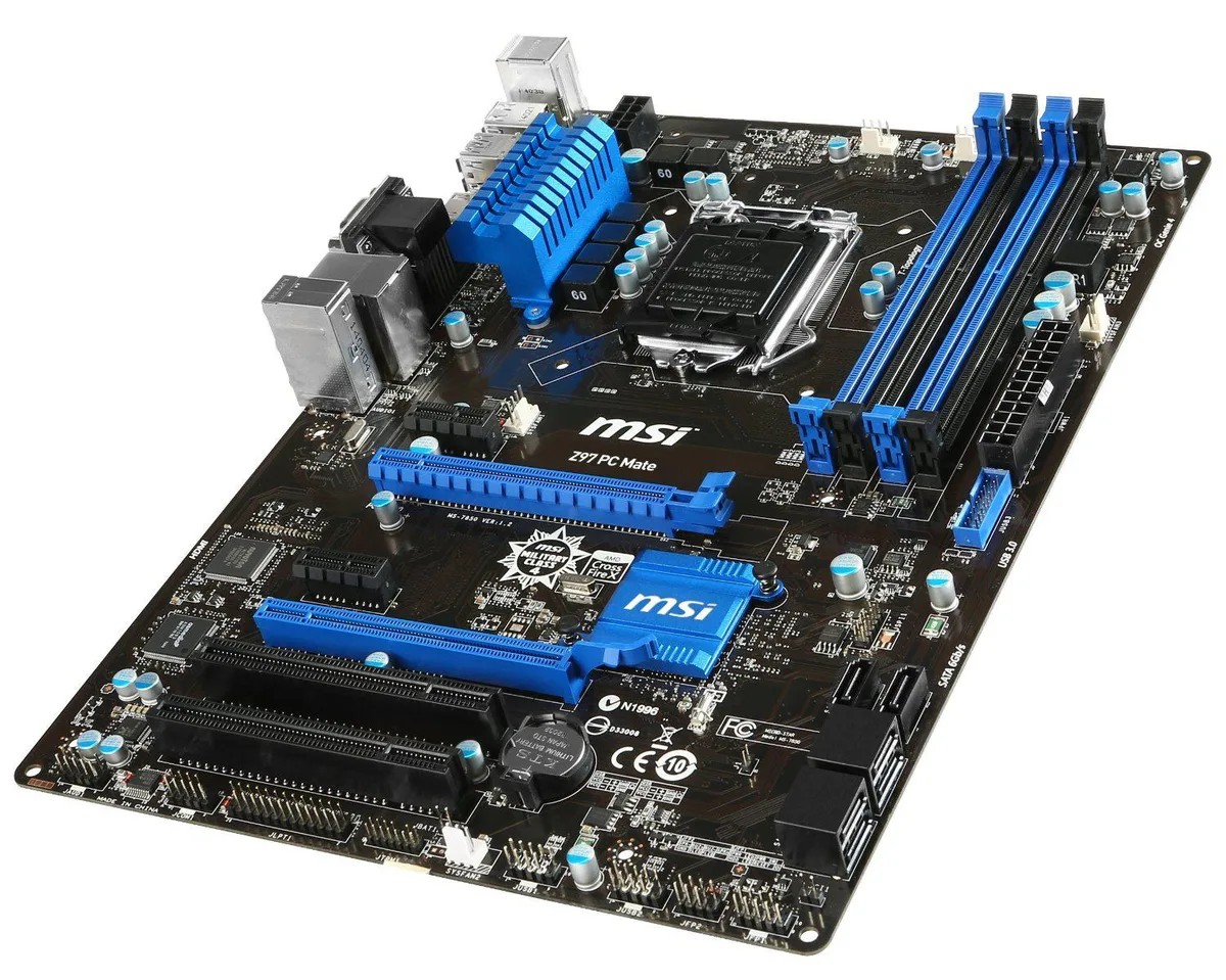 Rectangular ATX motherboard in black with silver heatsinks and blue PCIe slots