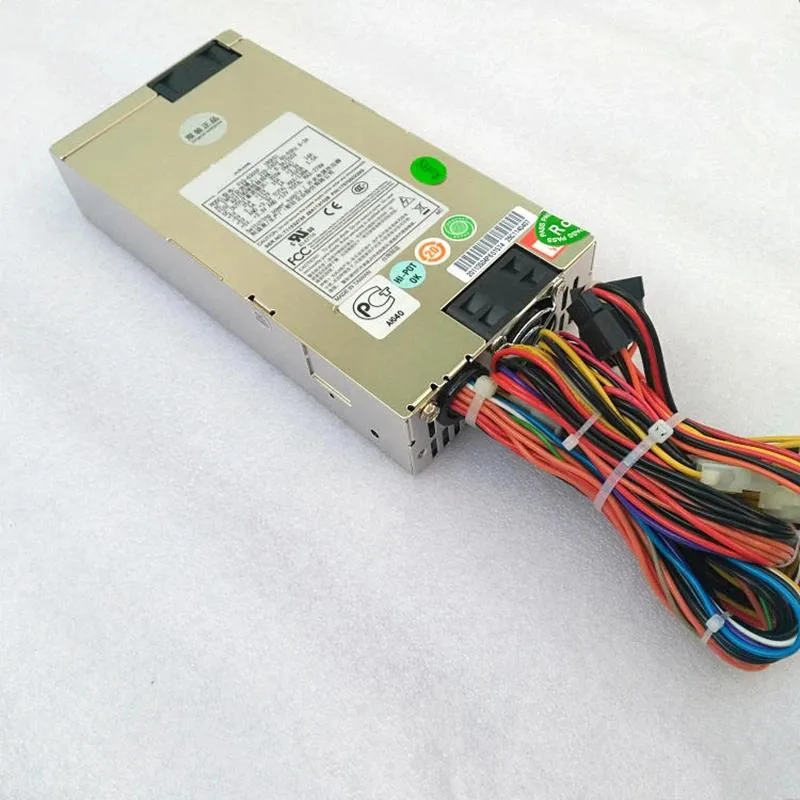 Silver 1U server power supply unit with rear fan grille and power socket
