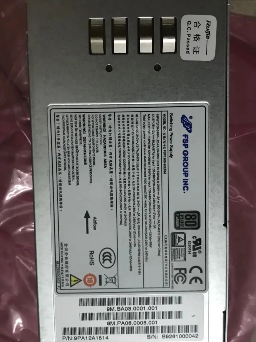 Silver rectangular server power supply unit with rear connector and fan grille