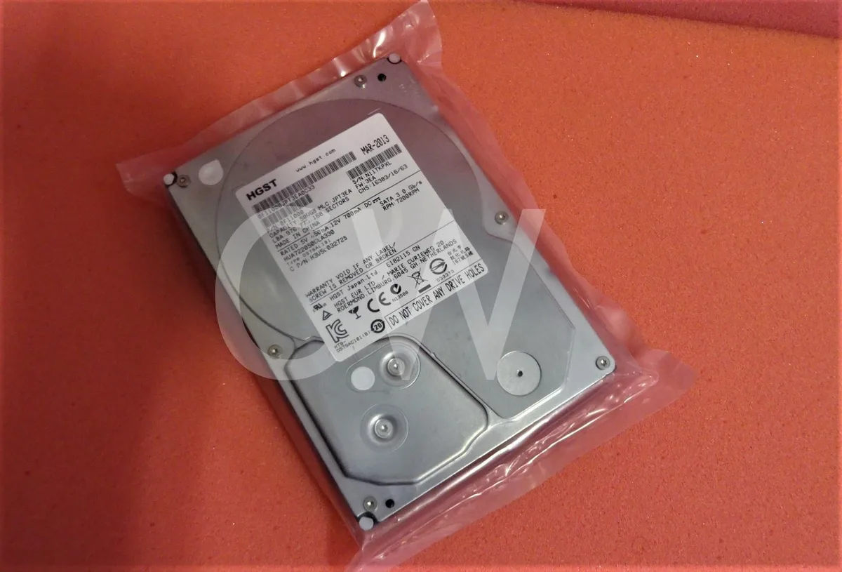 Silver 3.5 inch SATA hard drive with circuit board visible