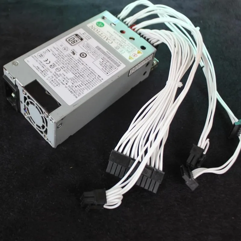 1U silver power supply unit with rear fan grille and power socket