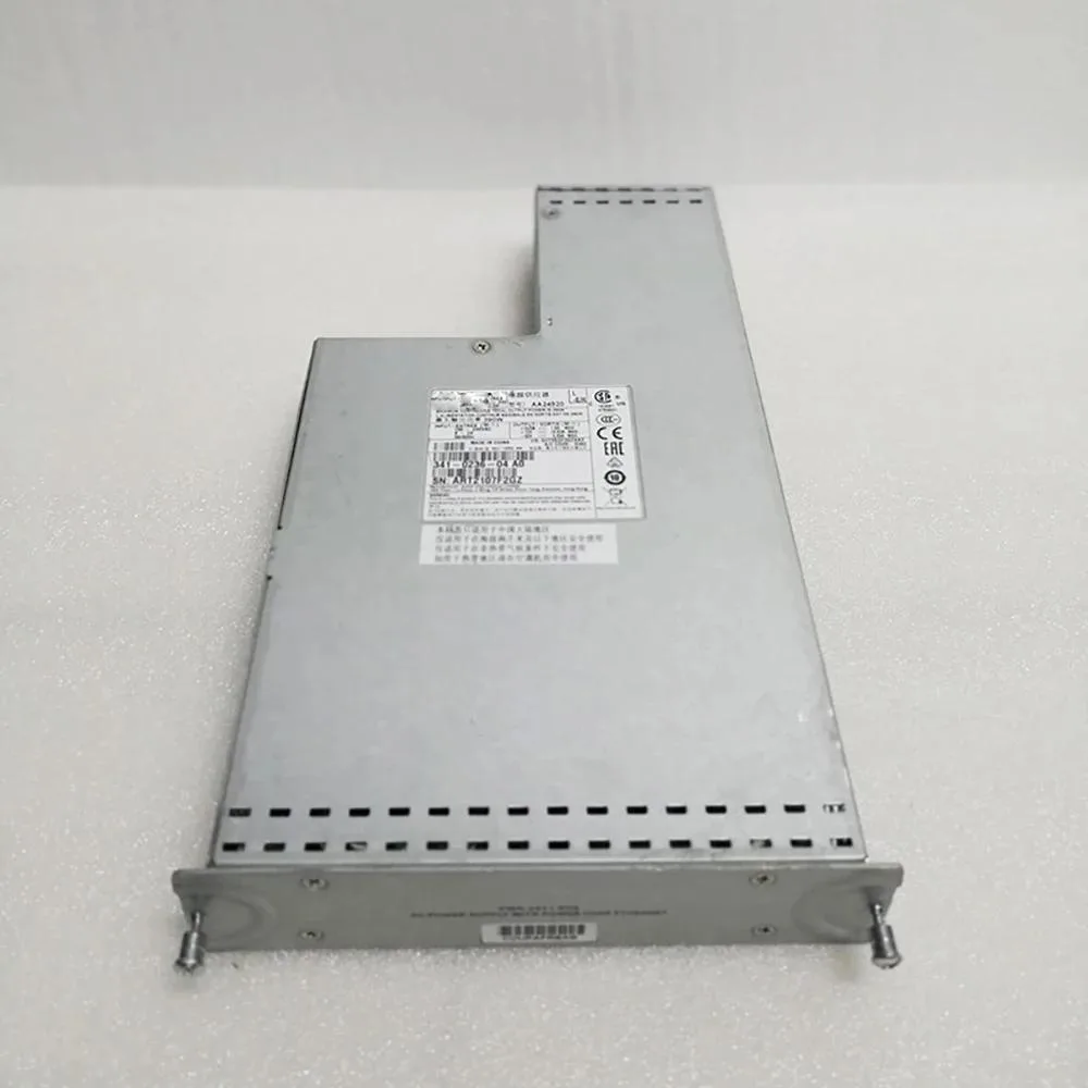 Rectangular ATX power supply unit, matte black metal casing with ventilation grille and label showing model numbers 341-0236-04 390W