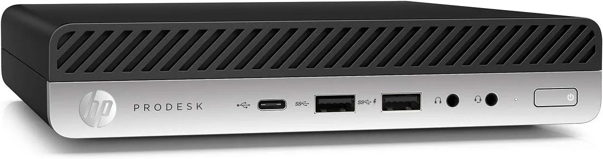 Small black rectangular mini desktop computer, matte finish