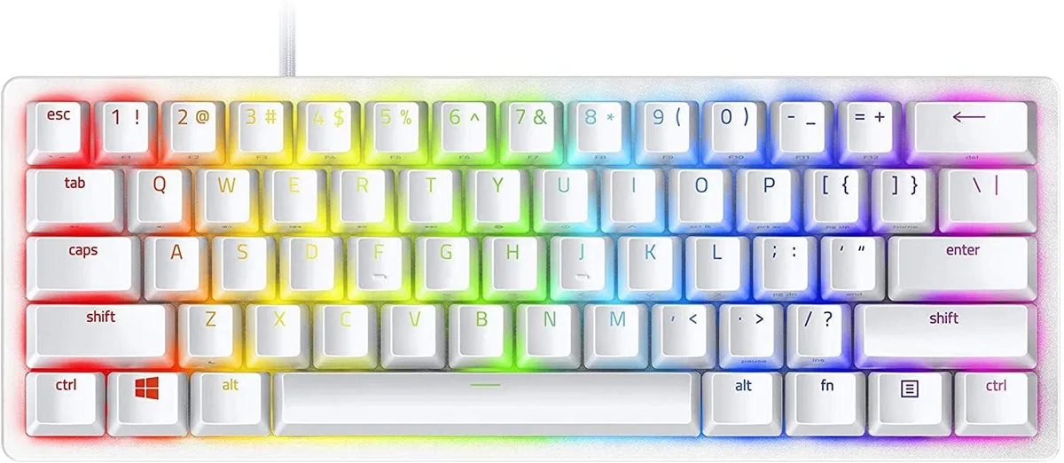 Compact white 60% keyboard with purple clicky switches and RGB lighting