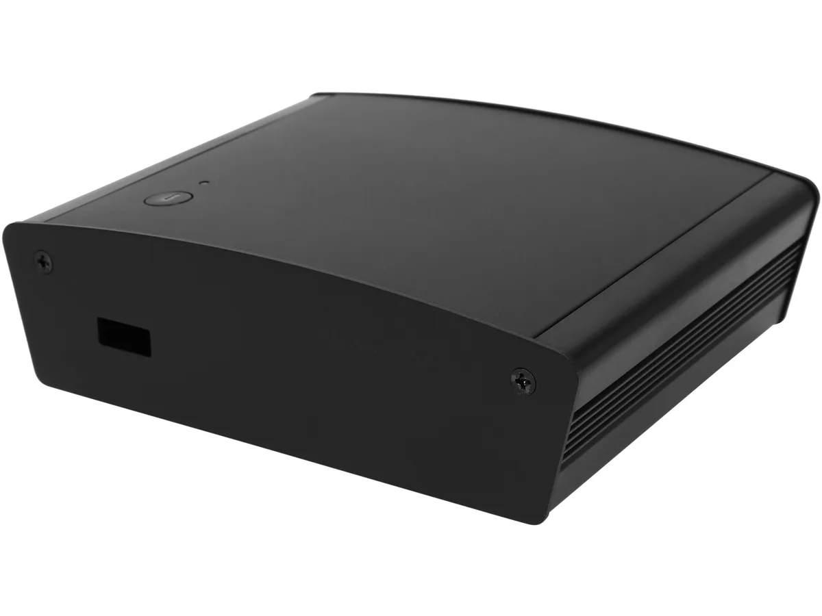 Small black aluminum NUC case with plastic accents, palm-sized rectangular shape, front USB port visible