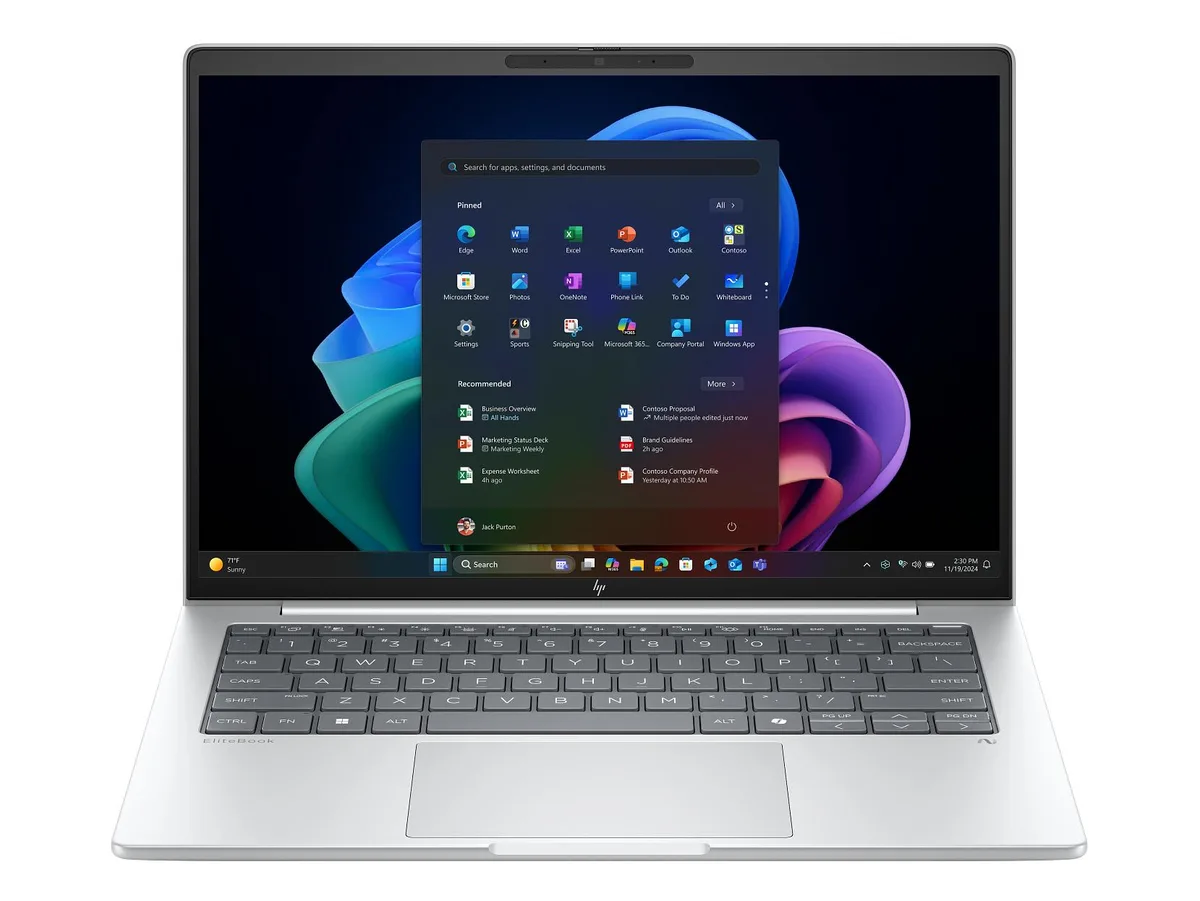 Silver 14 inch touchscreen laptop, thin tapered profile, matte finish
