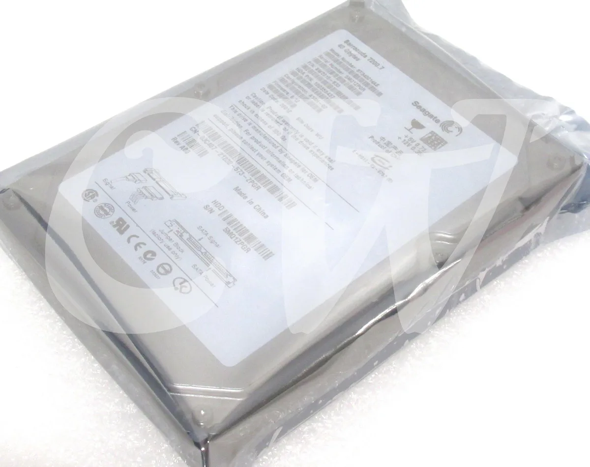Silver 3.5 inch SATA hard drive with circuit board visible