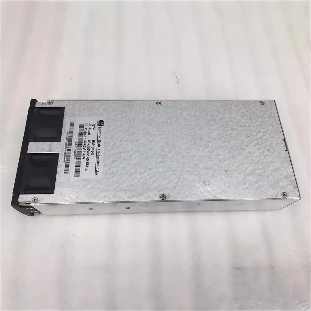 Rectangular silver ATX power supply unit with ventilation grille and label showing 48V 30A