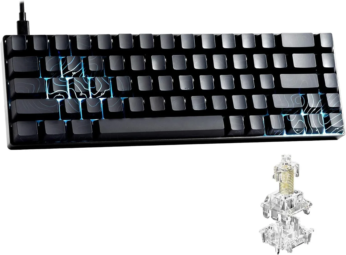 Compact 60 percent keyboard with black aluminium frame and dark keycaps