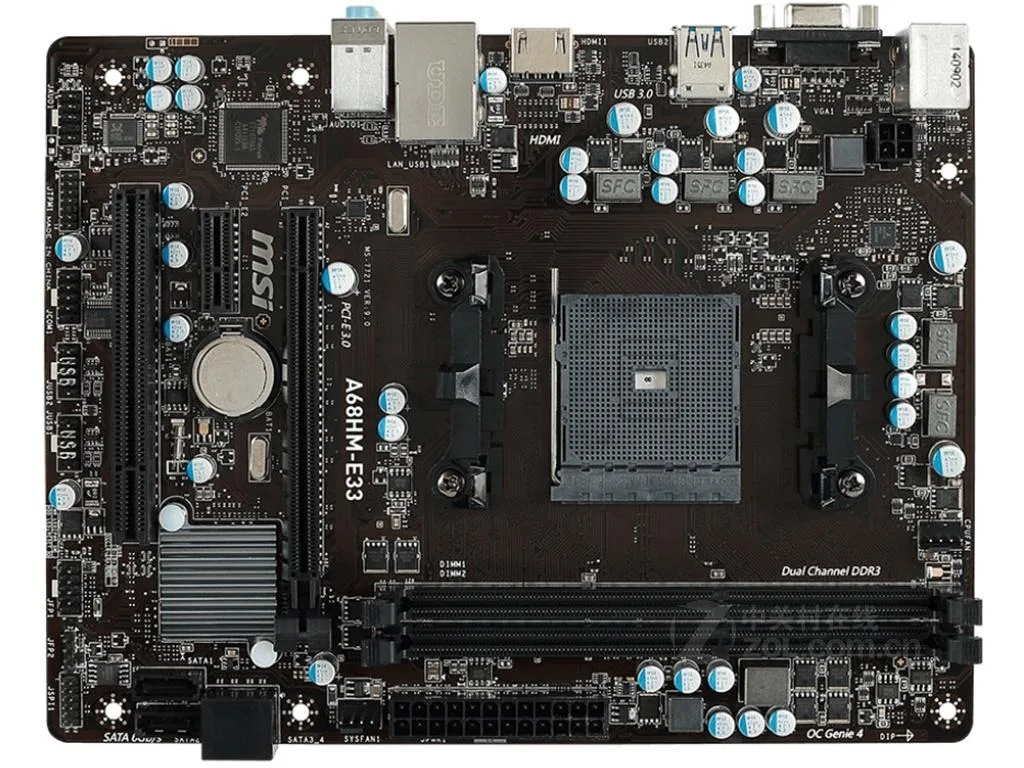 Green micro-ATX board with black sockets and silver heatsinks