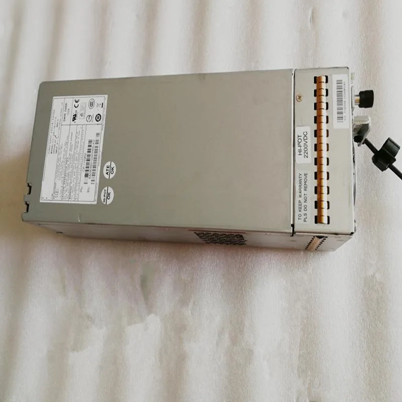 Silver rectangular ATX power supply unit with ventilation grille