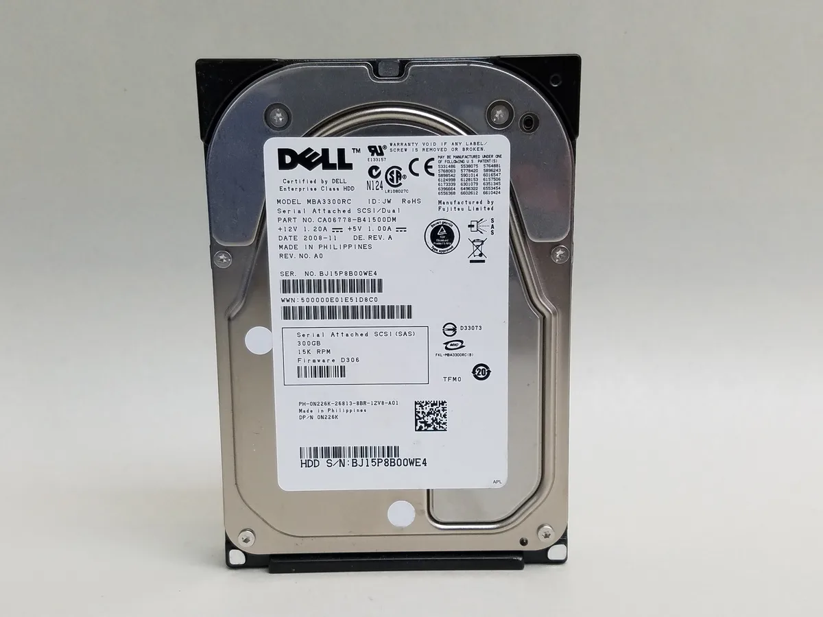 Fujitsu 3.5 inch SAS enterprise hard drive, silver metal casing with label, circuit board visible on underside