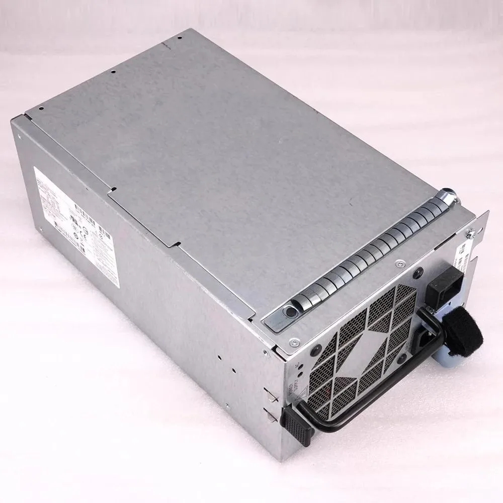 Silver ATX switching power supply unit with cooling fan and cable bundle