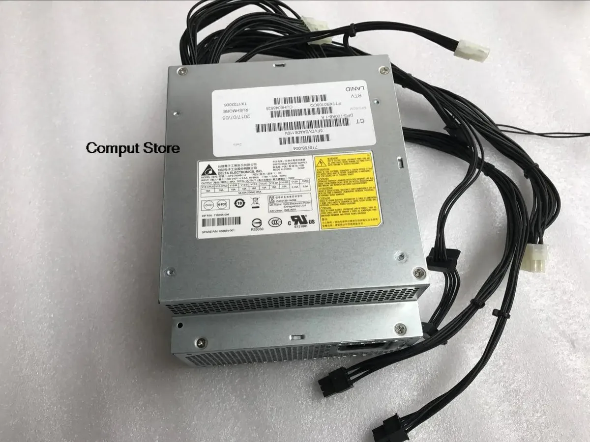 Rectangular metal ATX power supply unit with rear fan grille and side label