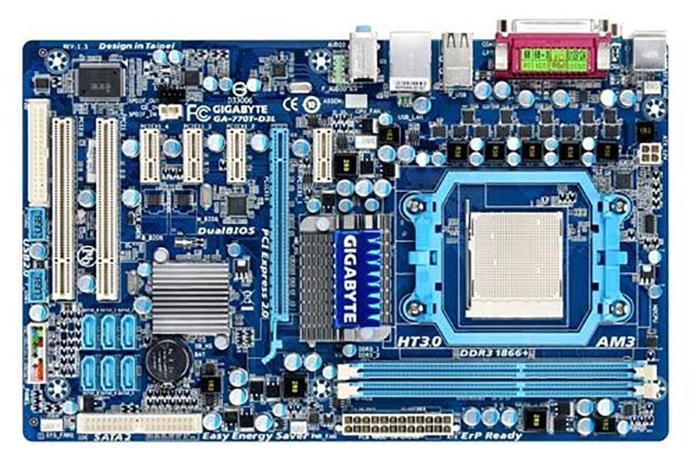 Rectangular ATX motherboard, dark PCB with blue DDR3 slots, white PCIe x16, black PCIe x1 and PCI slots, silver I/O shield
