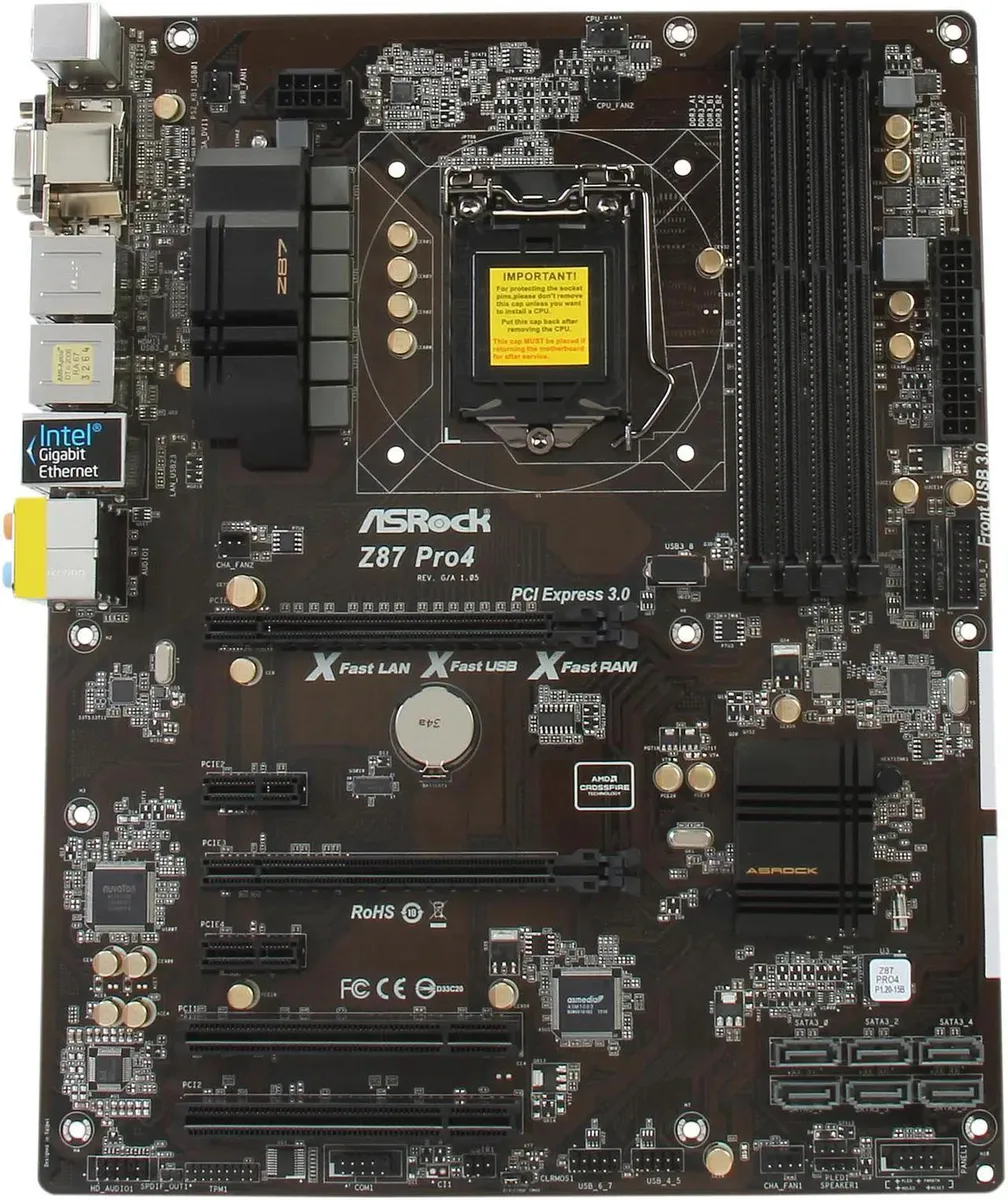 ATX motherboard, matte black PCB with silver heatsinks and blue slots