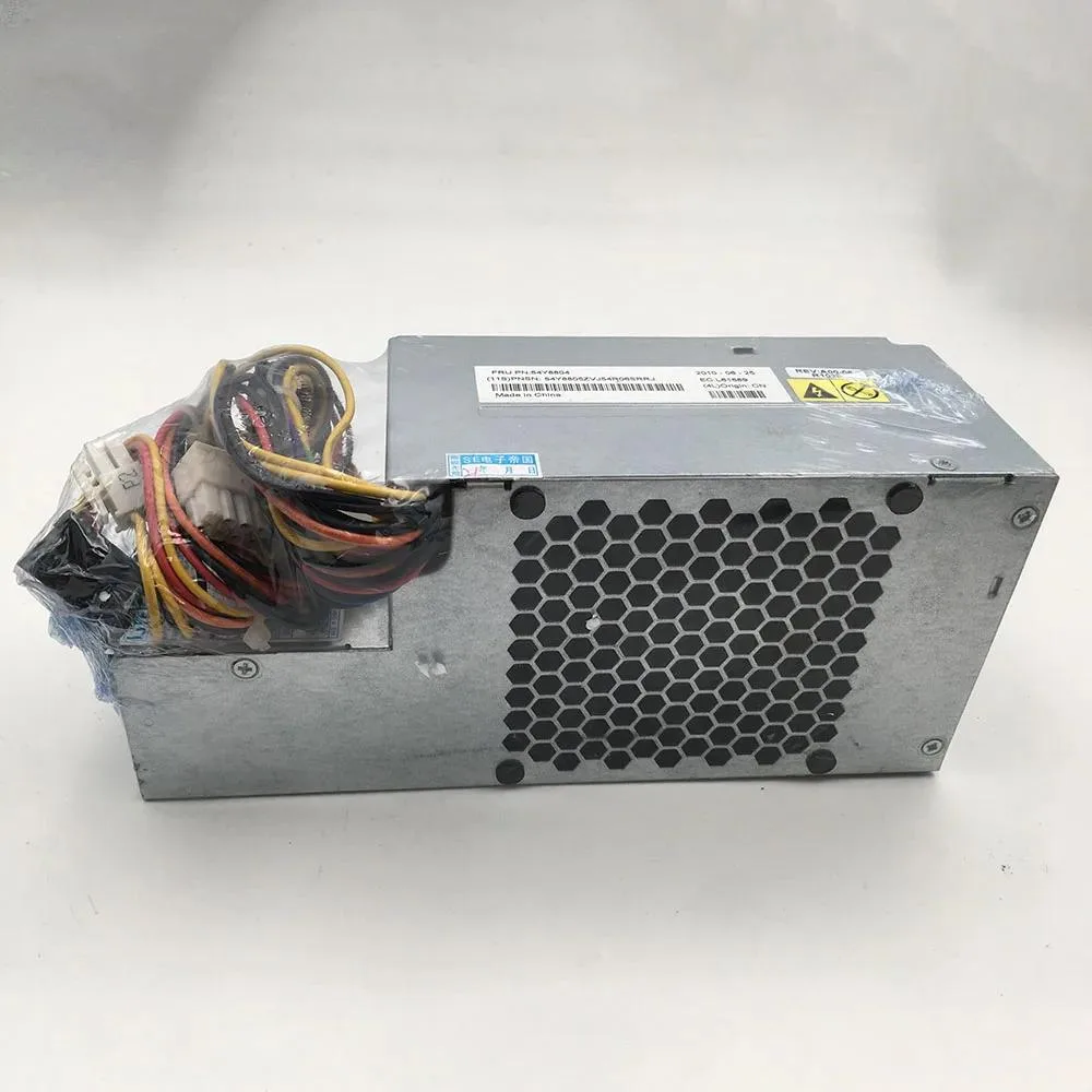 A silver ATX power supply unit with fan grille and cable bundle