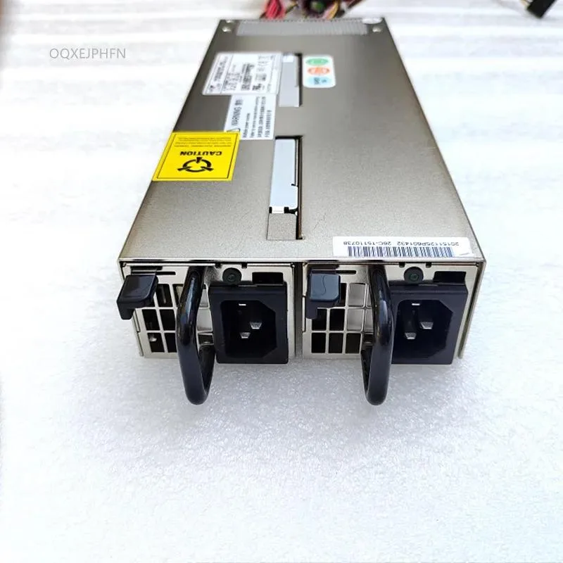 Compact silver ATX power supply unit with rear fan grille and power socket