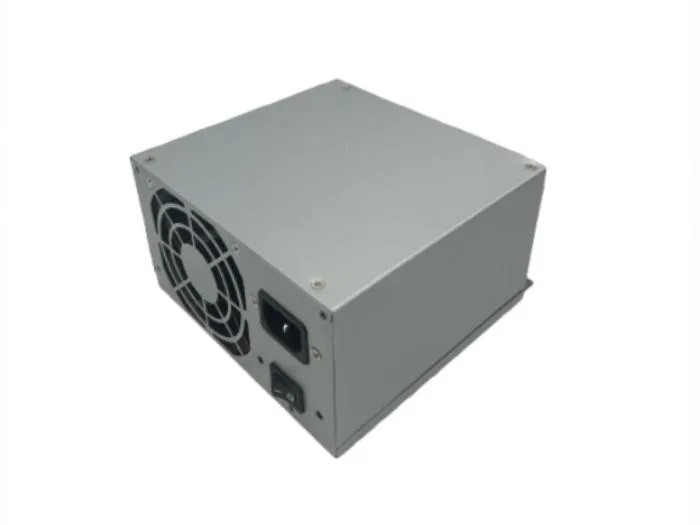 Rectangular metal server power supply unit with rear cooling fan and multiple cable connectors