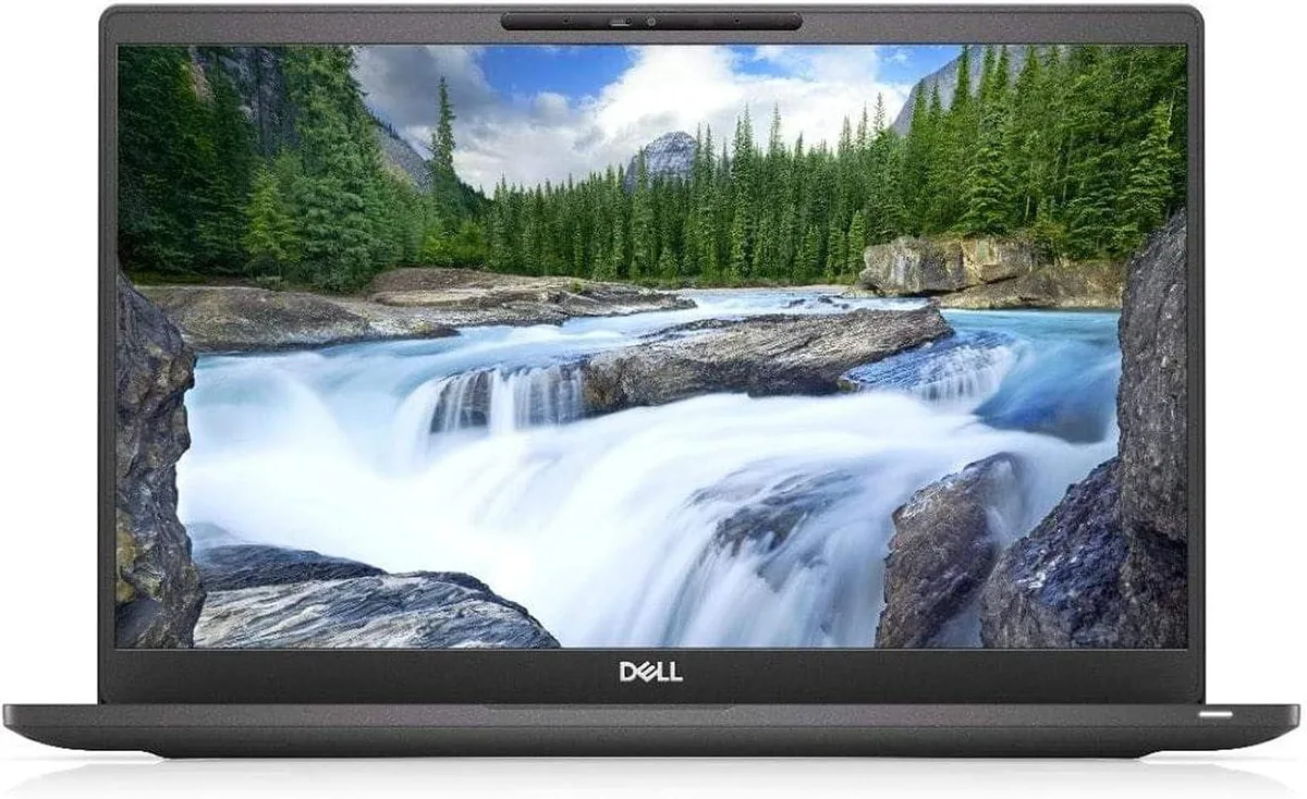 Silver Dell Latitude 7400 14 inch laptop closed on white background