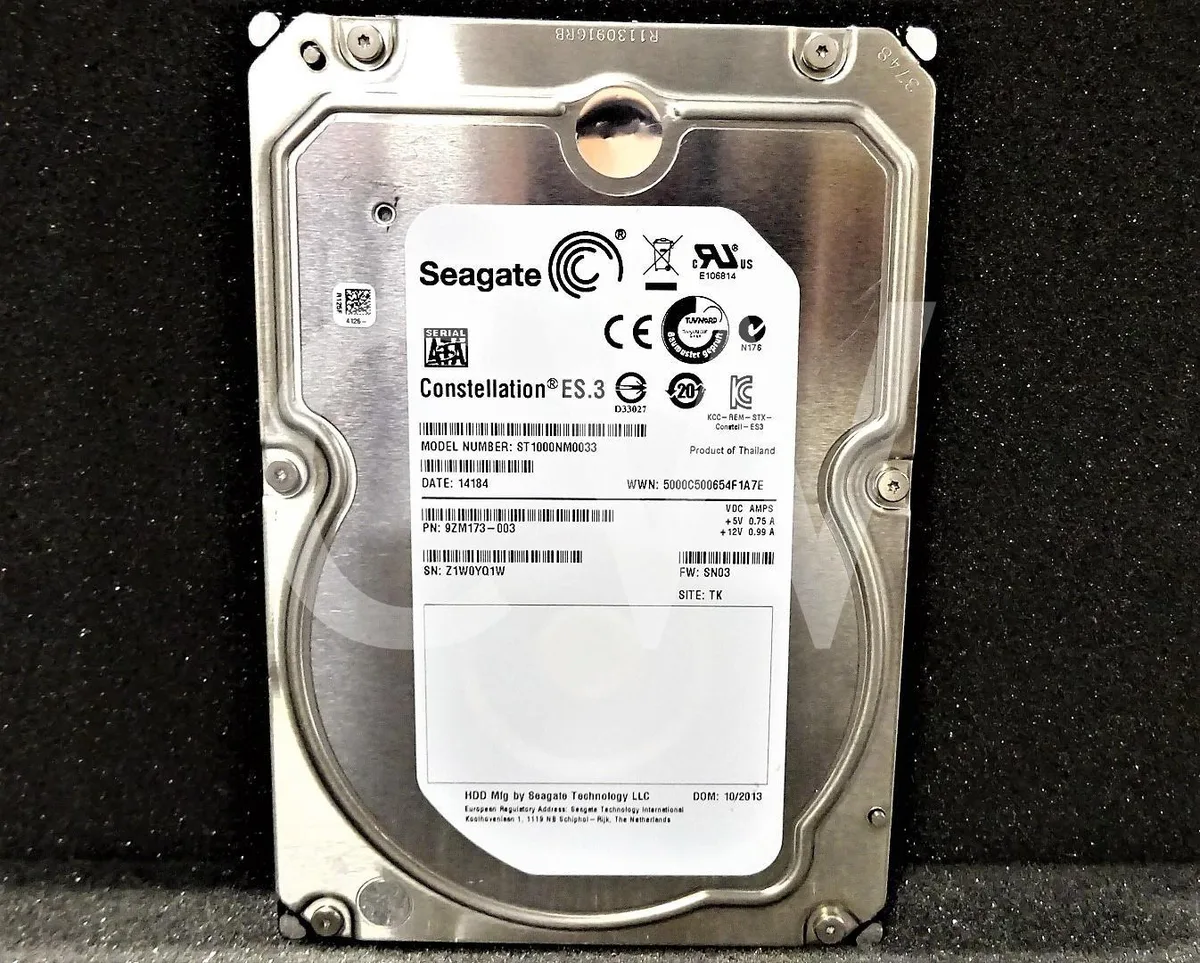 Silver 3.5 inch SATA hard drive with circuit board visible