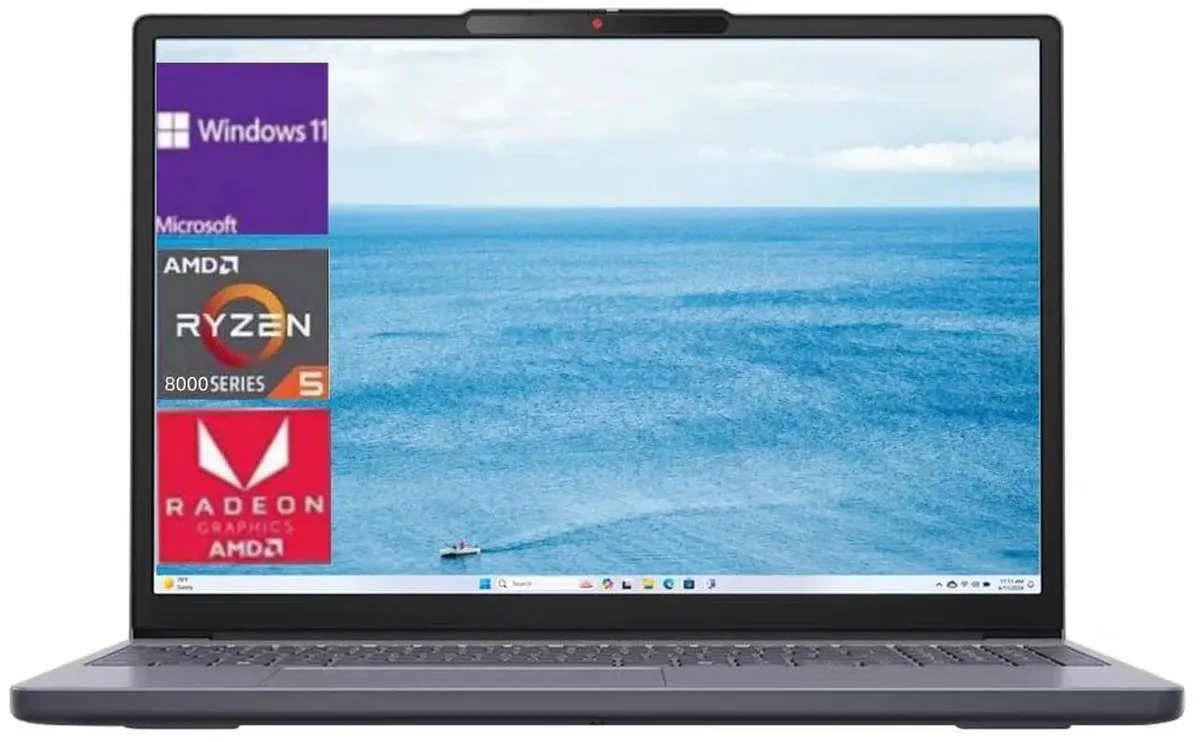 Slim Luna Grey laptop open showing 15.3 inch touch display and backlit keyboard