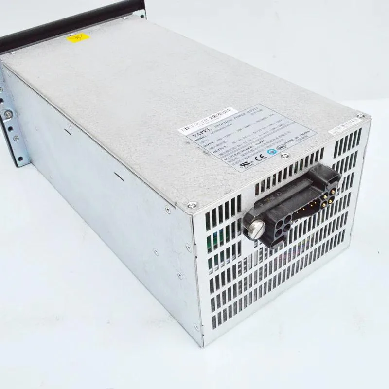 Rectangular metal power supply unit with ventilation grilles and label showing 48V 50A
