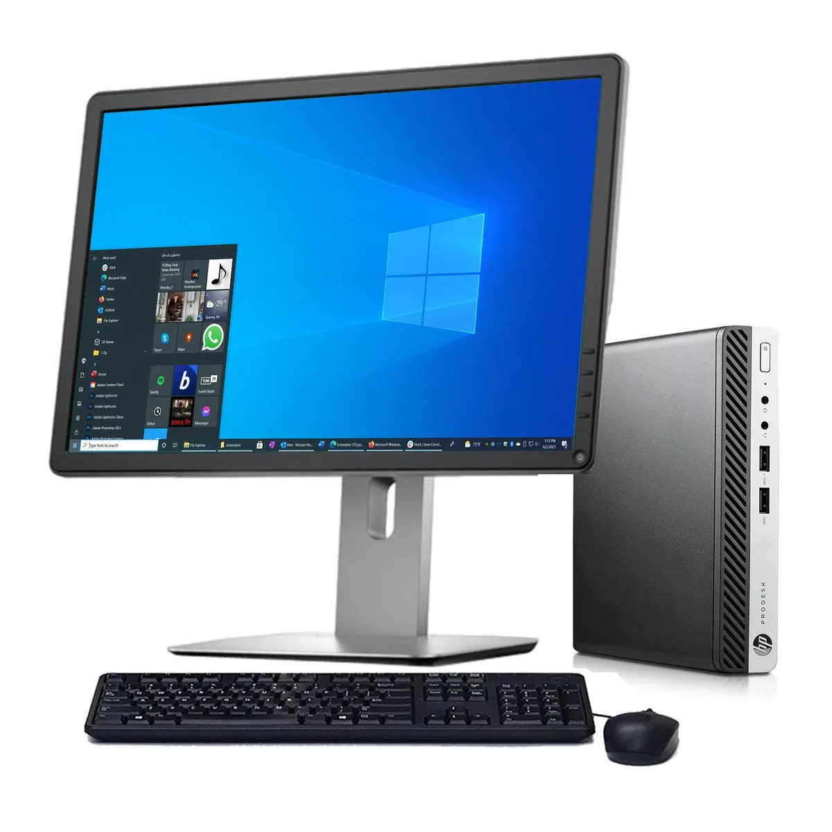 Black mini desktop tower beside a 17 inch LCD monitor