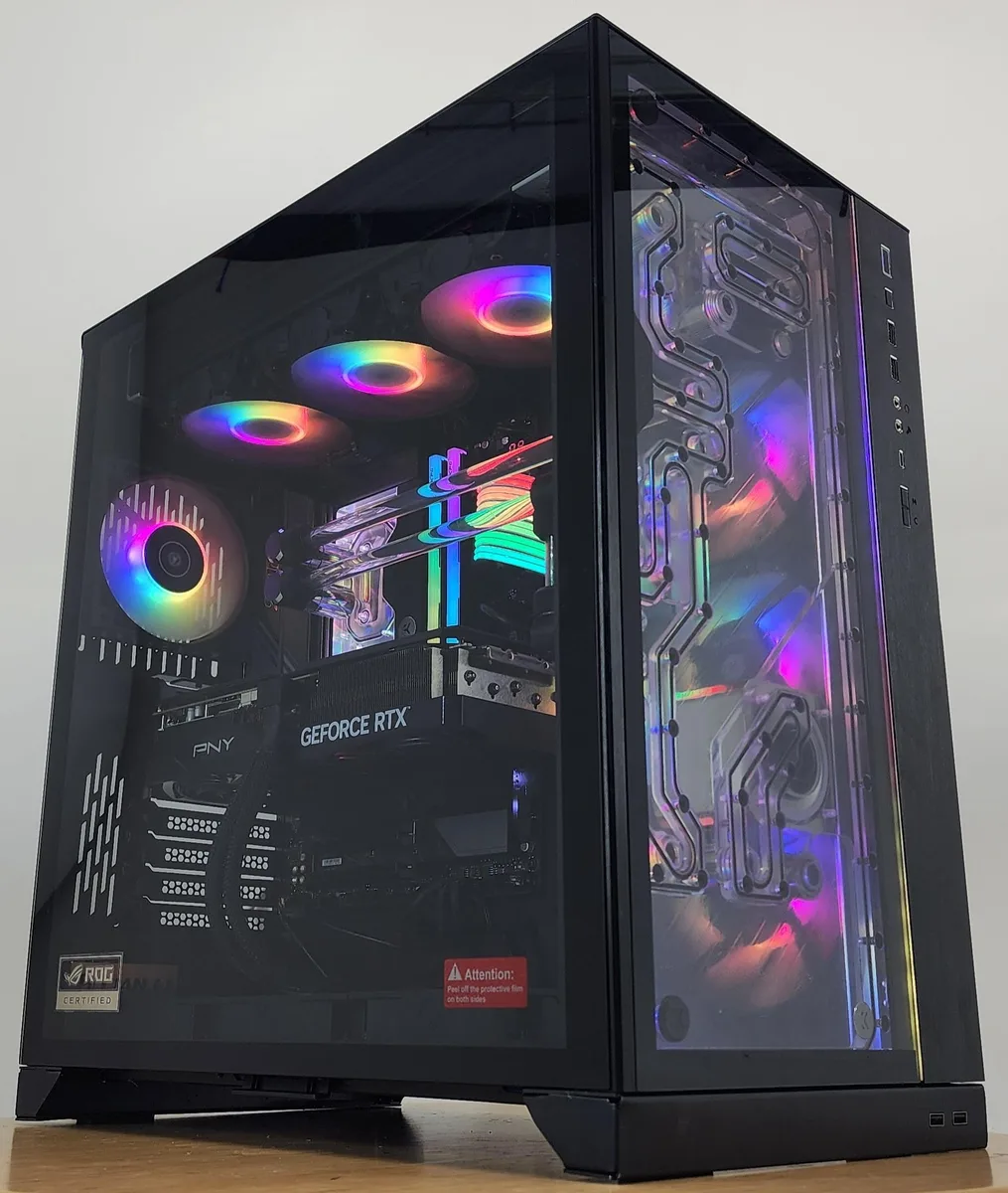 Black Lian Li O11 Dynamic XL ATX case with 360mm EK custom loop visible through tempered glass side panel
