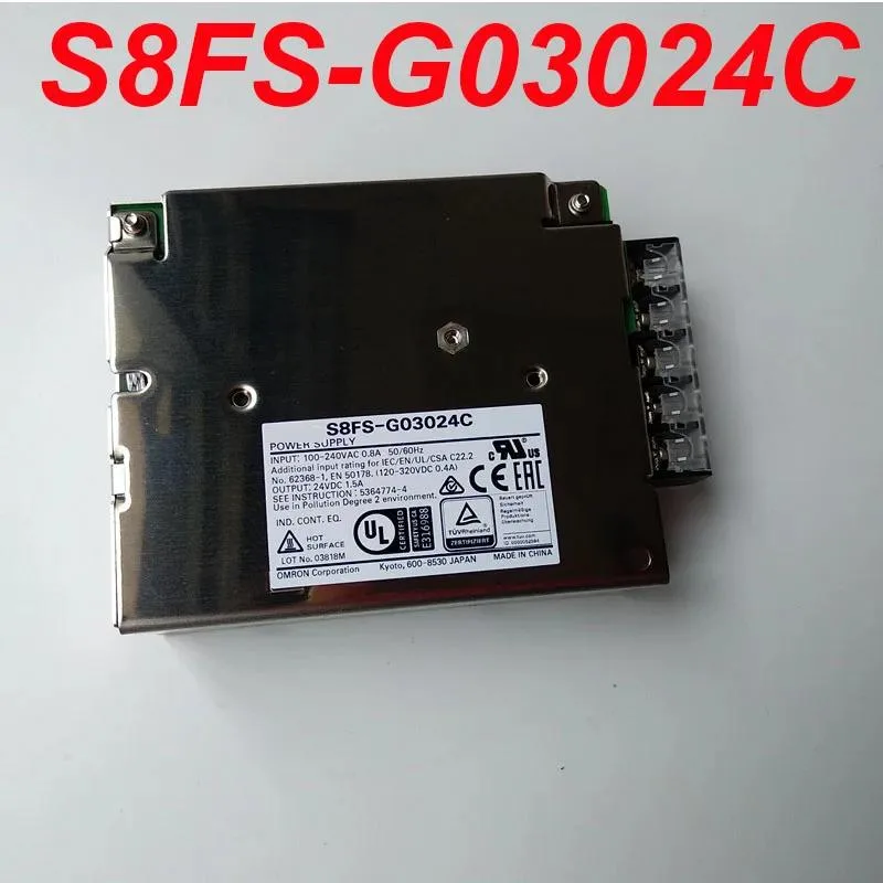 Rectangular metal ATX power supply unit with ventilation slots