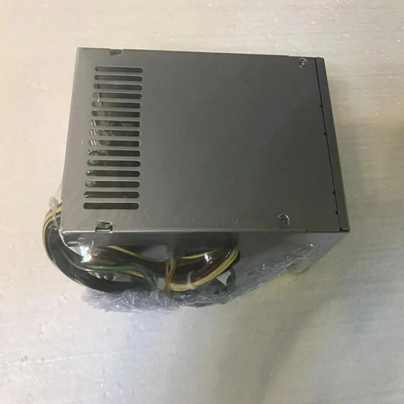 A standard ATX power supply unit in a matte black metal enclosure with a rear fan grille and side label