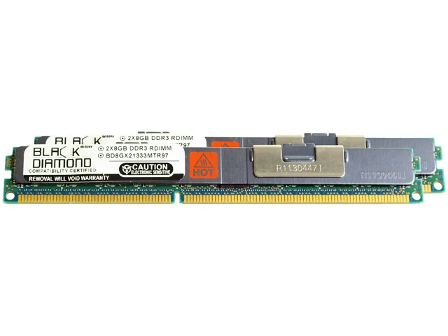 Two green DDR3 DIMMs, black heatsinks, gold contacts